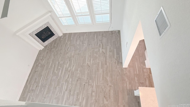 unfurnished living room with light wood-type flooring