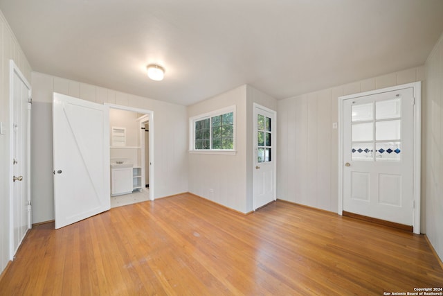 foyer with hardwood / wood-style floors