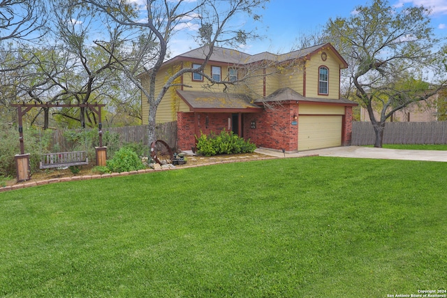 view of front of house featuring a front lawn and a garage