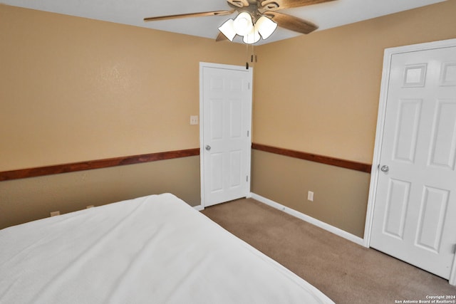 bedroom featuring carpet floors and ceiling fan