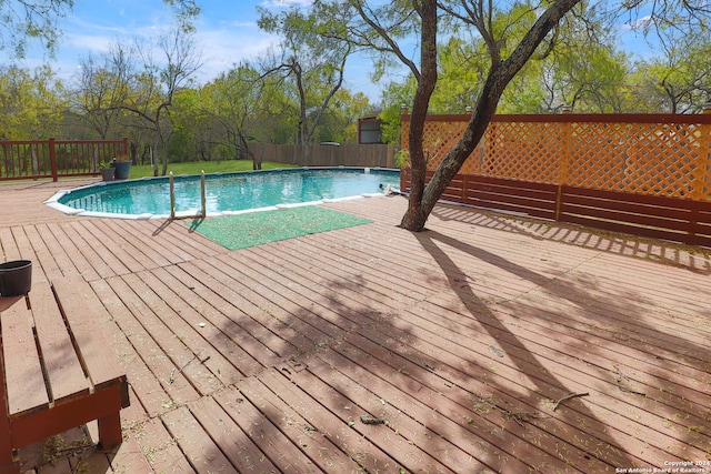 view of pool featuring a deck