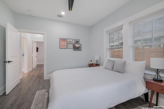 bedroom featuring hardwood / wood-style floors