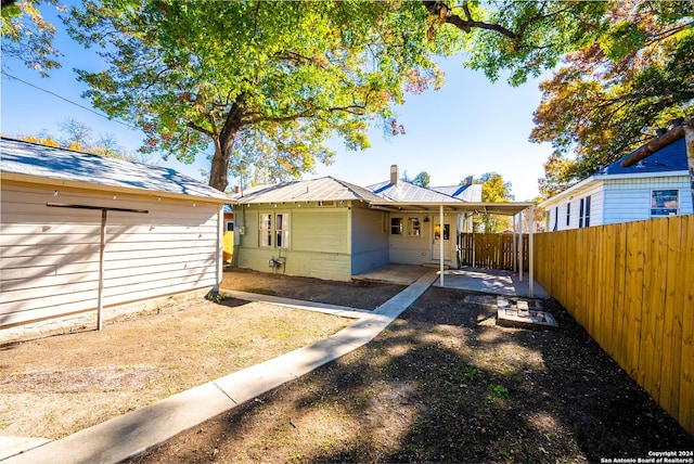 rear view of property with a patio