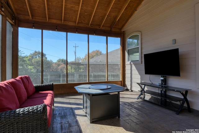 sunroom / solarium with lofted ceiling and wood ceiling