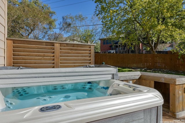 view of patio featuring a hot tub