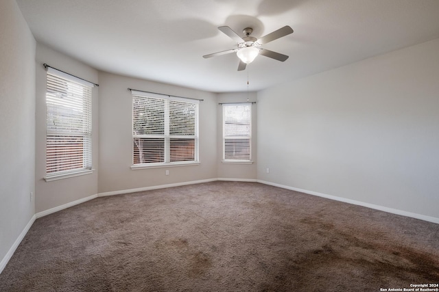 unfurnished room featuring carpet flooring and ceiling fan