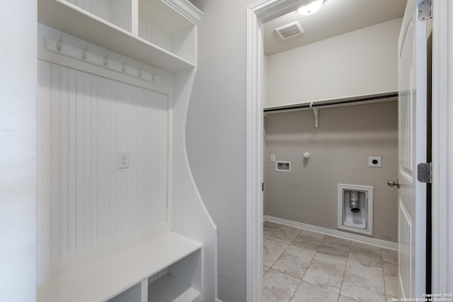 mudroom featuring light tile patterned floors