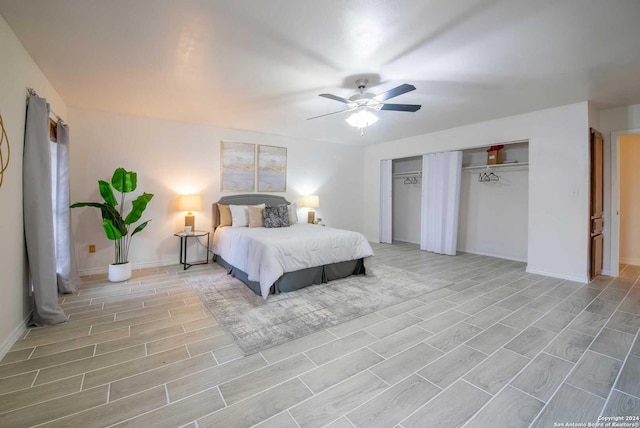 bedroom with ceiling fan, a closet, and light hardwood / wood-style floors