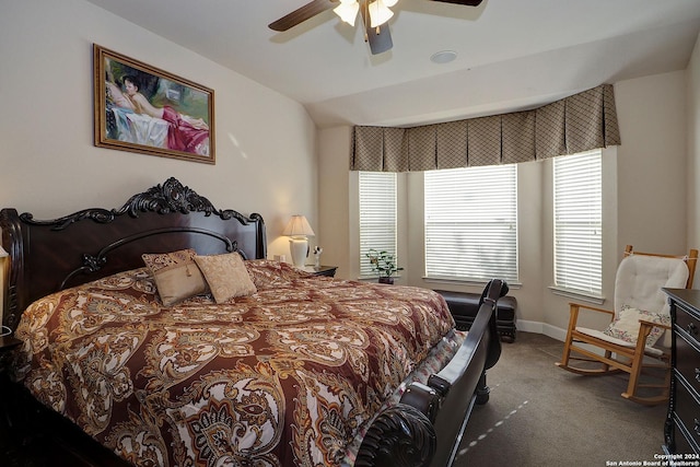 bedroom with carpet floors, vaulted ceiling, and ceiling fan