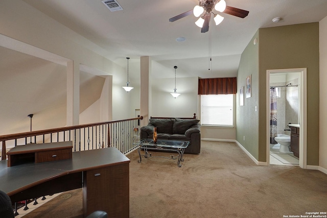 interior space featuring ceiling fan and lofted ceiling