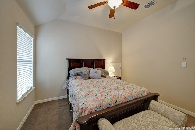 carpeted bedroom featuring ceiling fan, lofted ceiling, and multiple windows