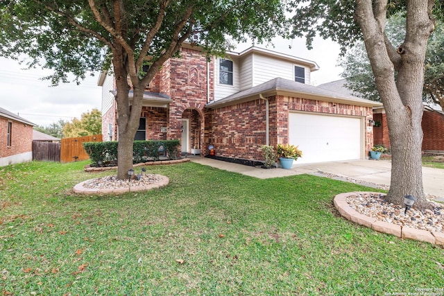 view of property with a garage and a front yard