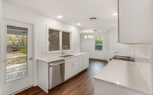 kitchen featuring white cabinetry, sink, a healthy amount of sunlight, and appliances with stainless steel finishes