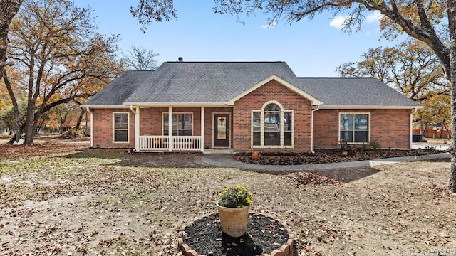 ranch-style home with a porch