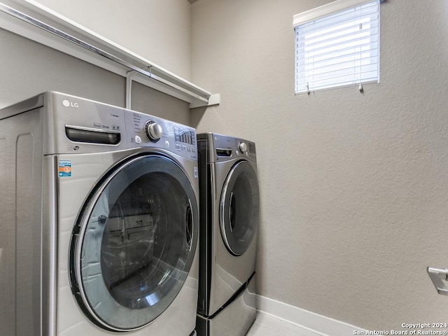 laundry area with washer and clothes dryer