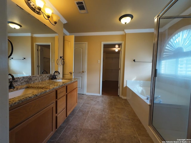 bathroom with tile patterned flooring, vanity, ornamental molding, and independent shower and bath