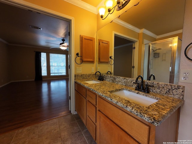 bathroom featuring ceiling fan, tile patterned flooring, vanity, and crown molding