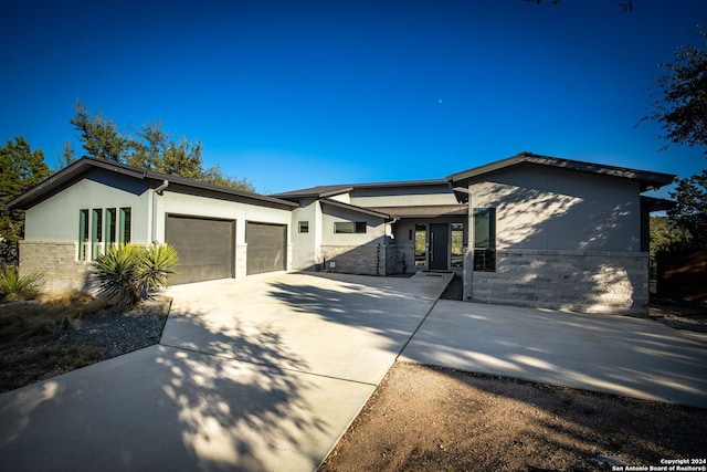 view of front of home with a garage