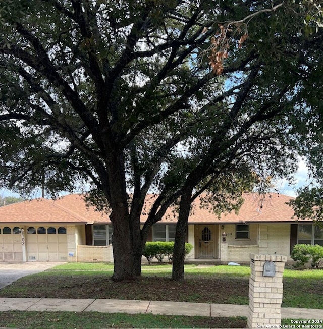 ranch-style house with a garage