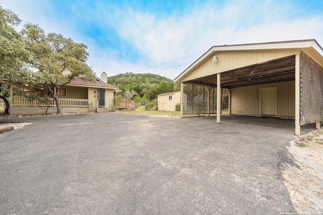 view of car parking with a carport