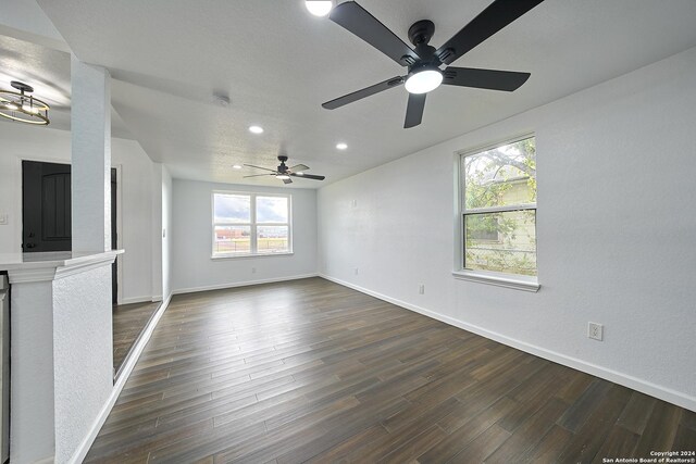 spare room featuring dark hardwood / wood-style floors