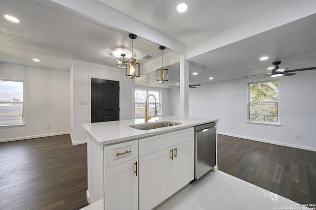 kitchen with sink, hanging light fixtures, dishwasher, a kitchen island with sink, and white cabinets