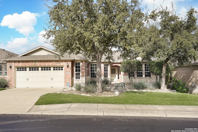 single story home featuring a garage