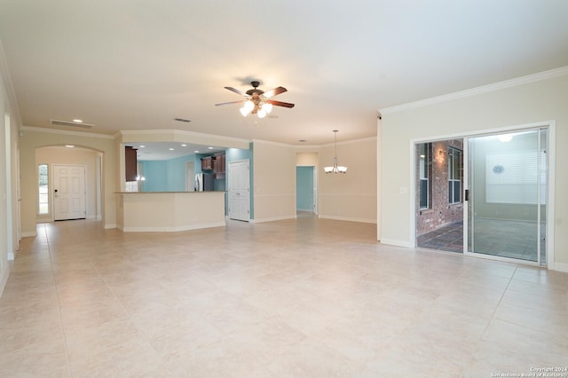 unfurnished living room featuring light tile patterned floors, ceiling fan with notable chandelier, and ornamental molding