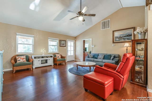 living room with ceiling fan, baseboards, visible vents, and dark wood finished floors