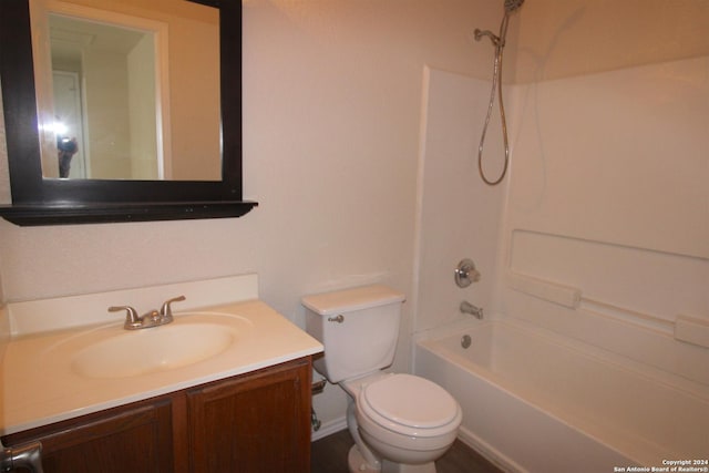 full bathroom featuring toilet, vanity, and bathing tub / shower combination