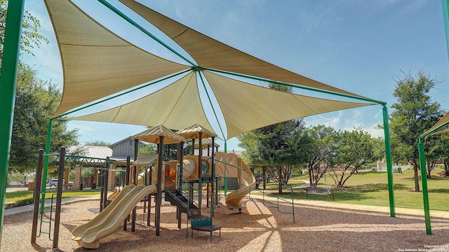 view of playground with a lawn