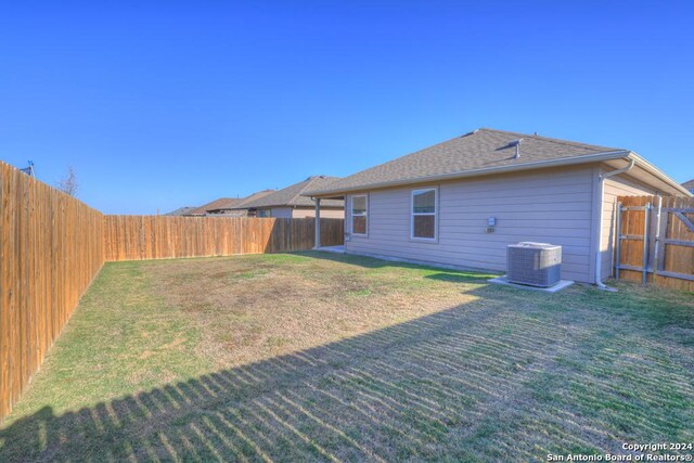 view of yard featuring central AC