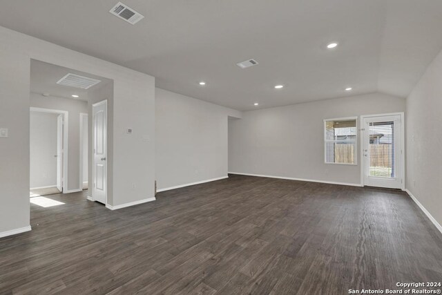 spare room featuring dark hardwood / wood-style flooring