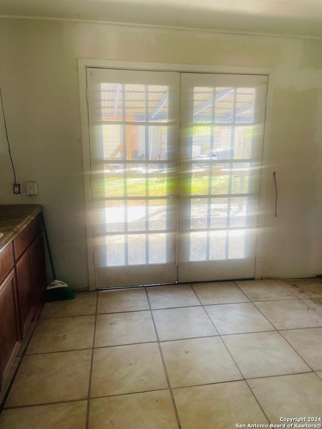 interior space featuring light tile patterned floors