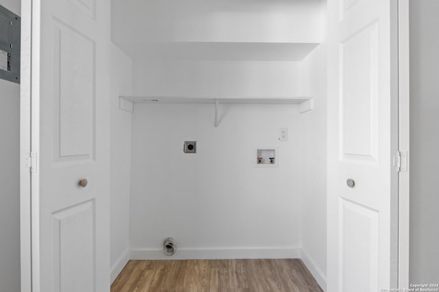 laundry area featuring hookup for a washing machine, wood-type flooring, and hookup for an electric dryer