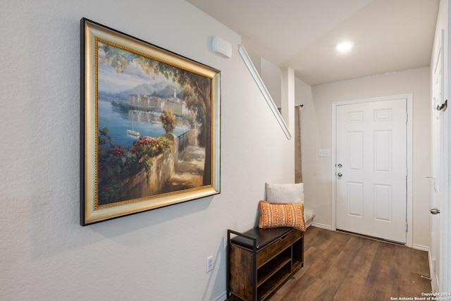 hallway featuring dark hardwood / wood-style flooring