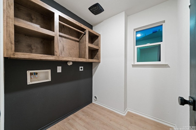 laundry room with electric dryer hookup, light wood-type flooring, and hookup for a washing machine