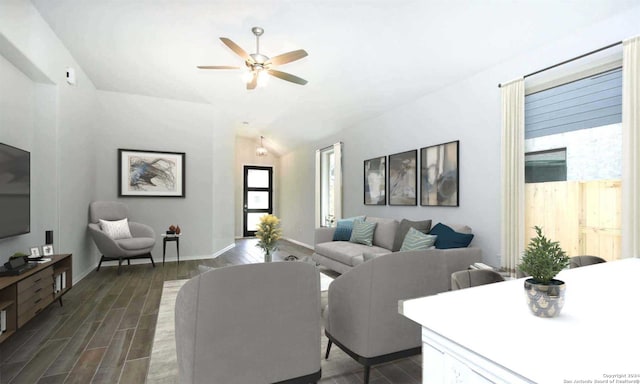 living room featuring plenty of natural light, ceiling fan, dark hardwood / wood-style flooring, and vaulted ceiling