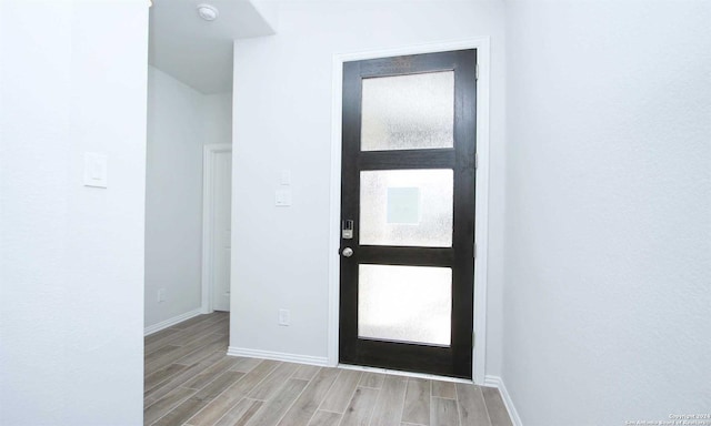 foyer featuring light wood-type flooring