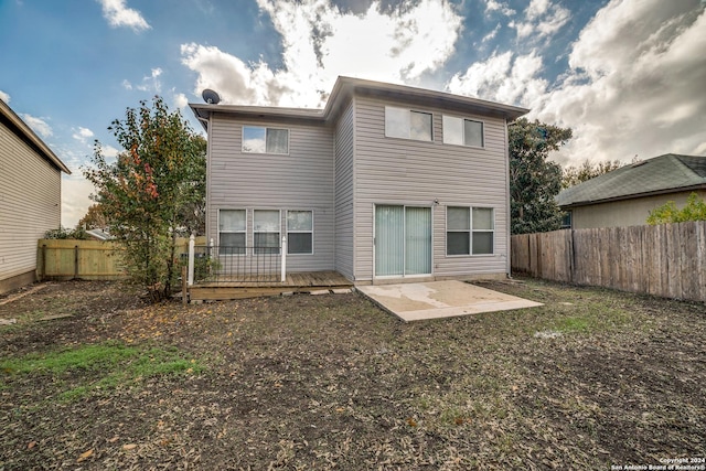 rear view of house featuring a patio