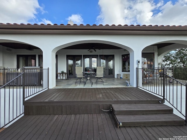 wooden terrace with ceiling fan