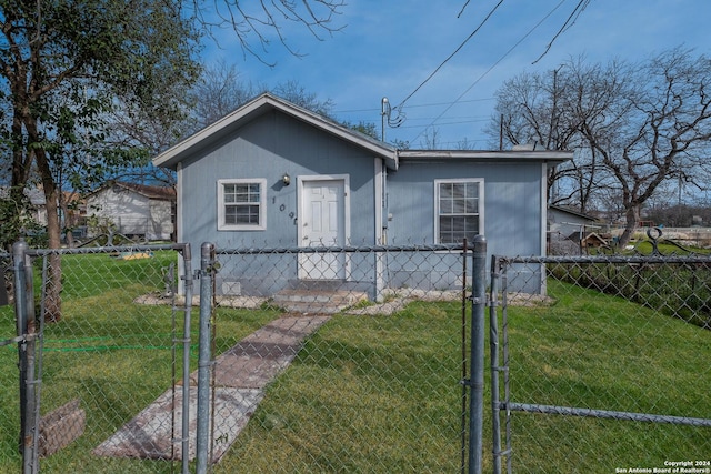 view of front of home with a front yard