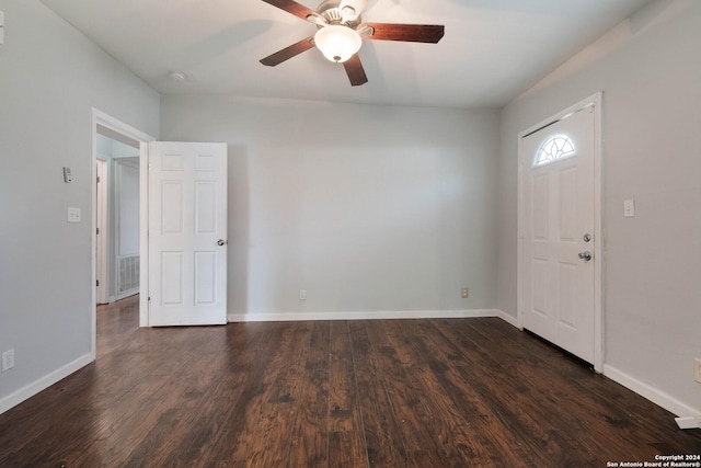 foyer with ceiling fan and dark hardwood / wood-style flooring