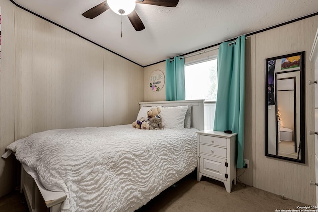 bedroom with ceiling fan and light colored carpet