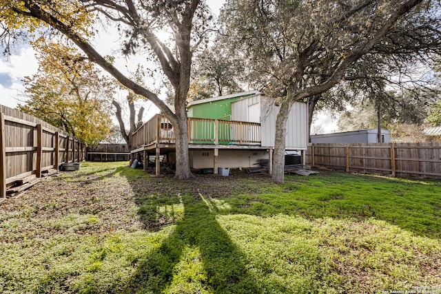 view of yard featuring a wooden deck