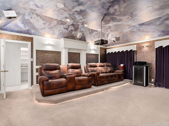 cinema with carpet floors, vaulted ceiling, and crown molding