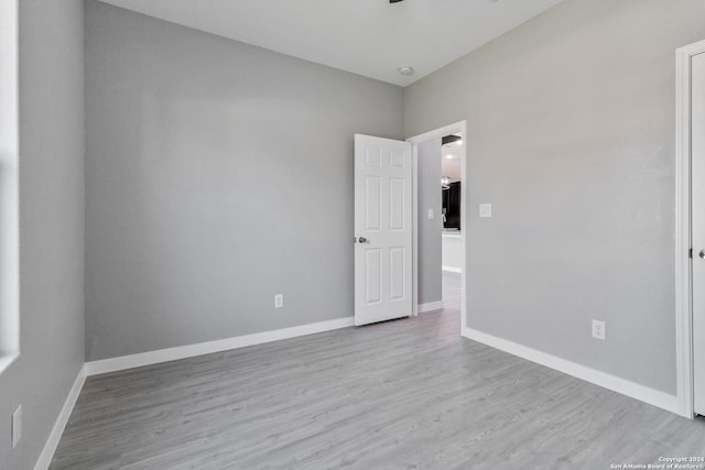 unfurnished room featuring light hardwood / wood-style floors