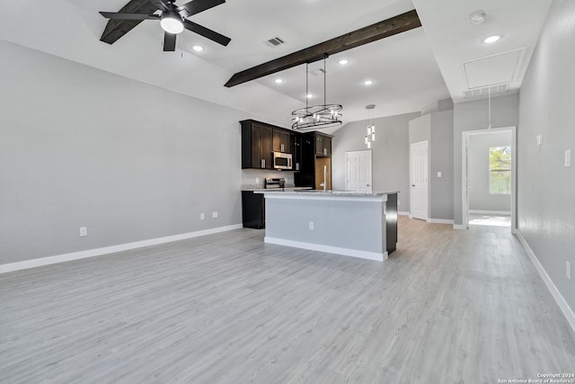 kitchen with ceiling fan, a center island with sink, vaulted ceiling with beams, light hardwood / wood-style floors, and hanging light fixtures