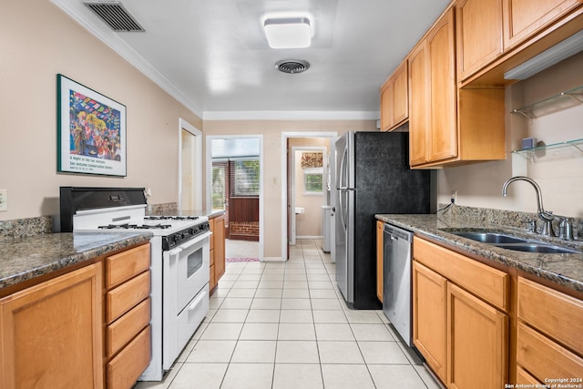 kitchen with crown molding, sink, white gas range oven, stainless steel dishwasher, and light tile patterned flooring