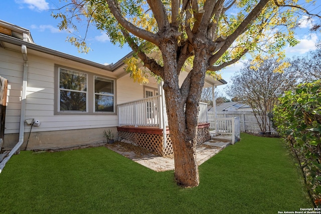 view of yard with a deck